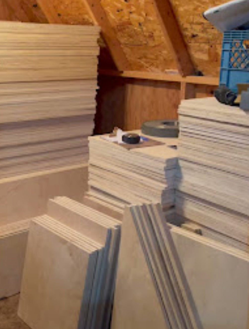 Large stock of birch and MDF panels in warehouse